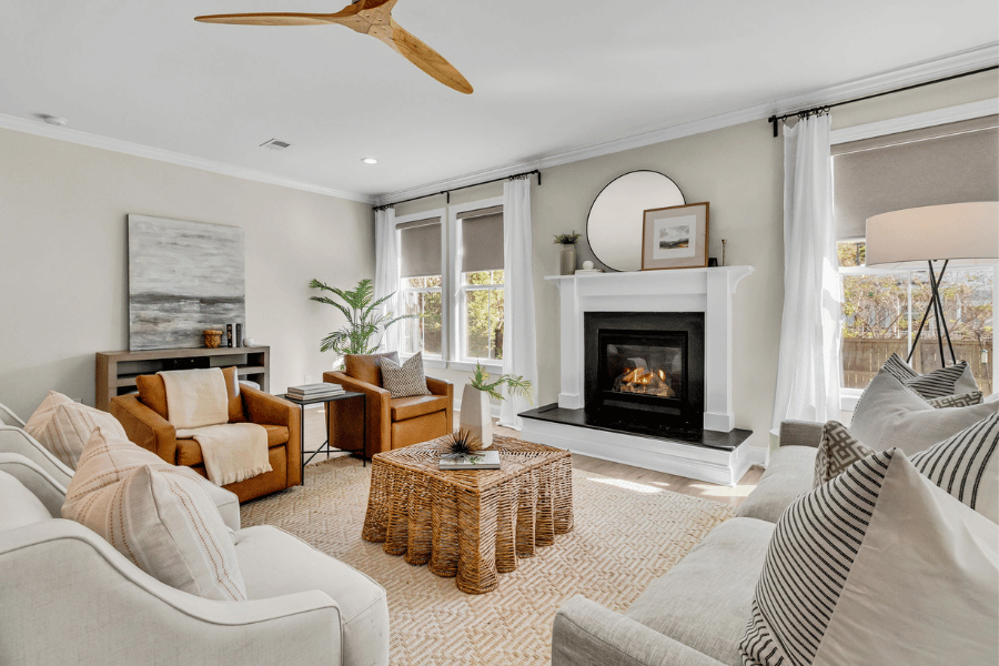 Professionally staged living room in a Charleston area home showcasing inviting furniture and neutral décor for home buyers